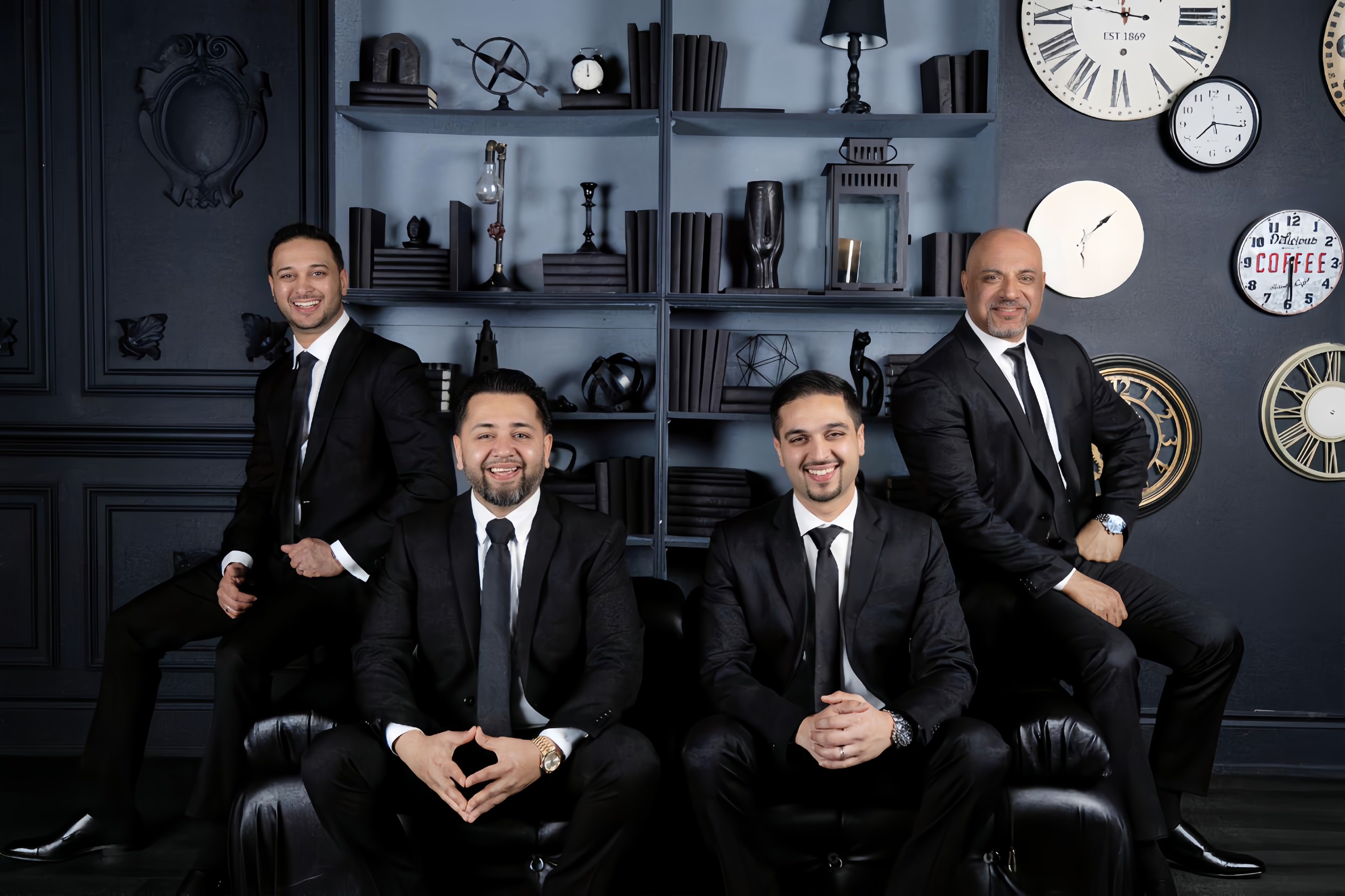 The Beg and Sood team together in a studio portrait